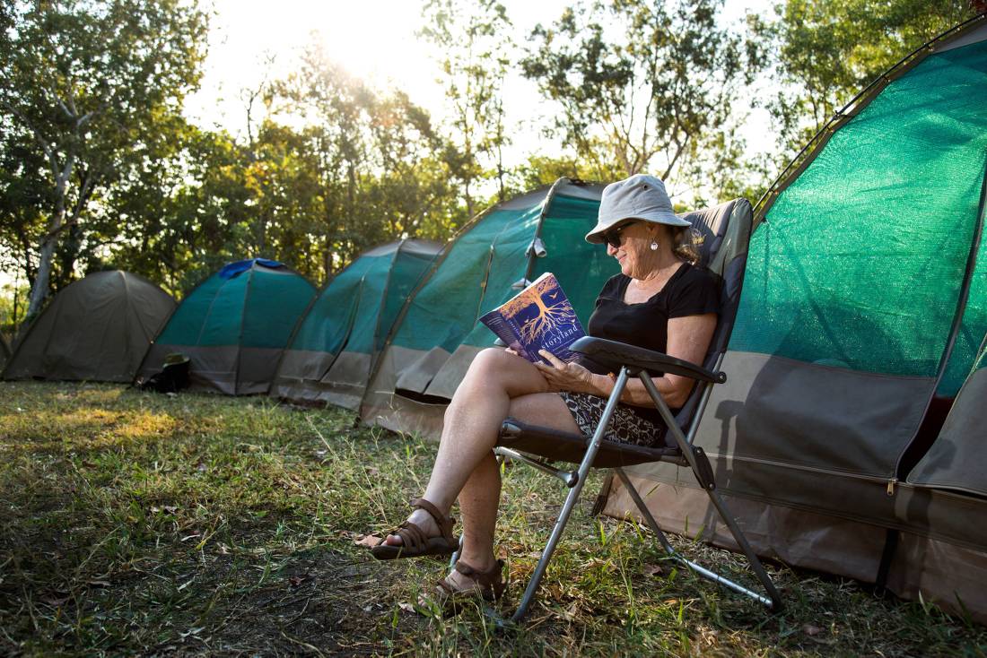 Relaxing with a book by our wilderness campsites |  <i>Nicholas Gouldhurst</i>